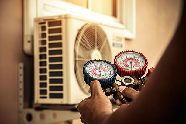 Professional Heat Pump Repair technician working in Grover, WY